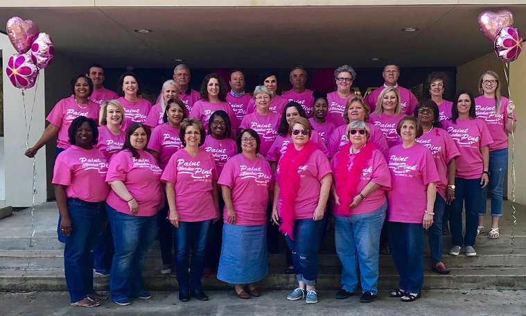 Photo of UMB employees wearing pink shirts